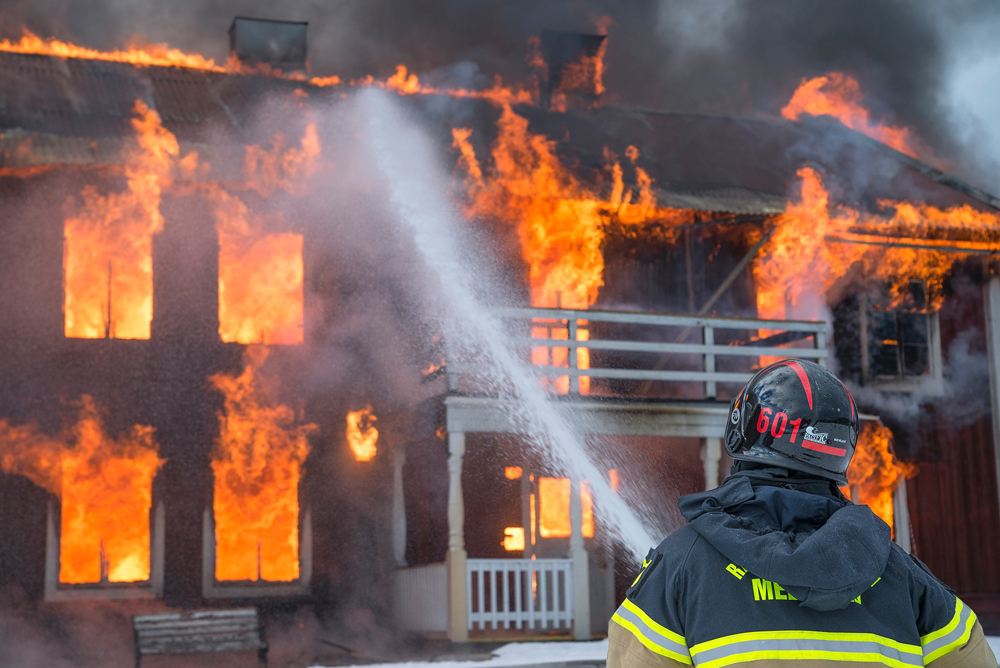 image showing a house on fire
